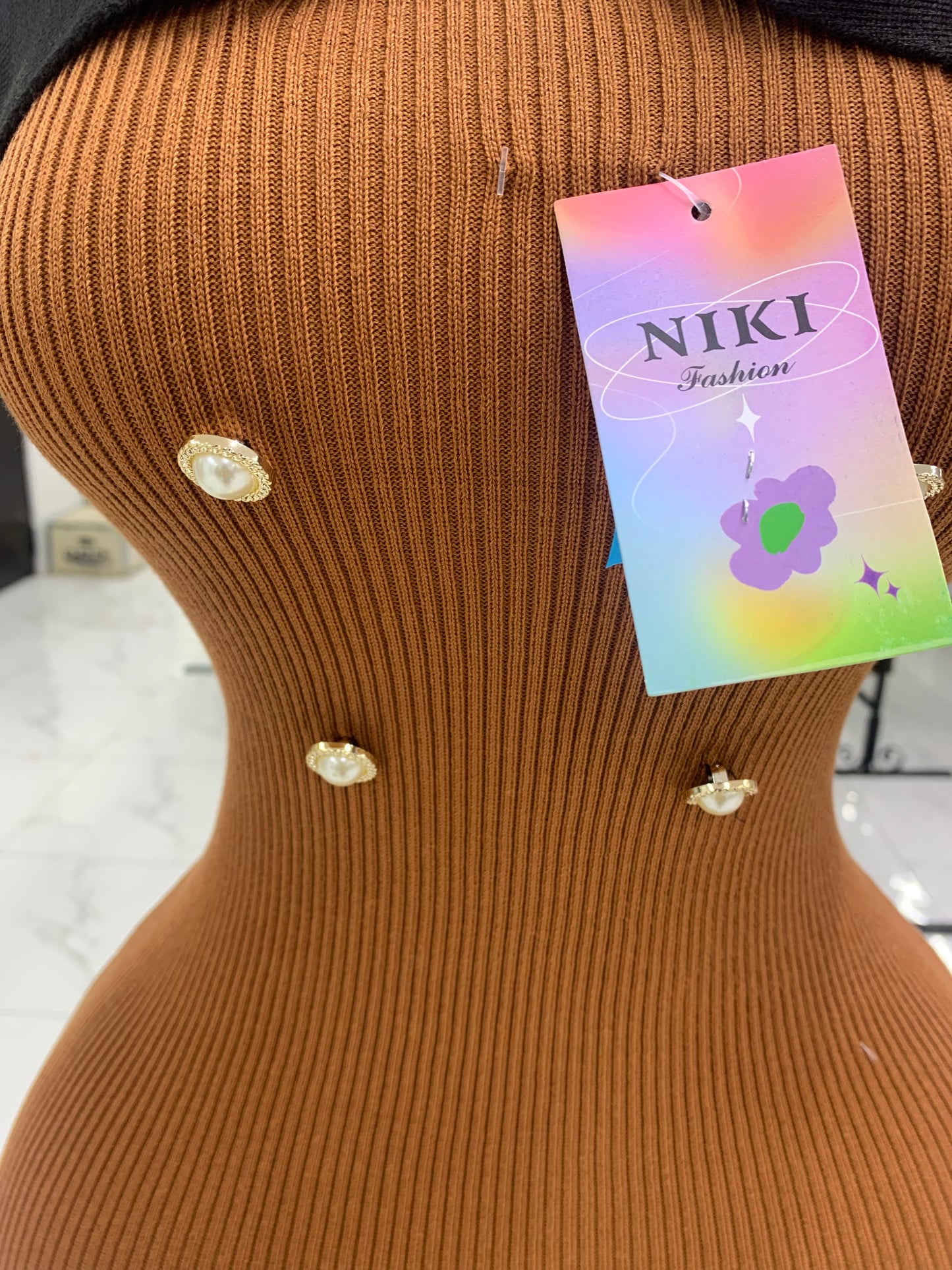 Double breasted brown gown