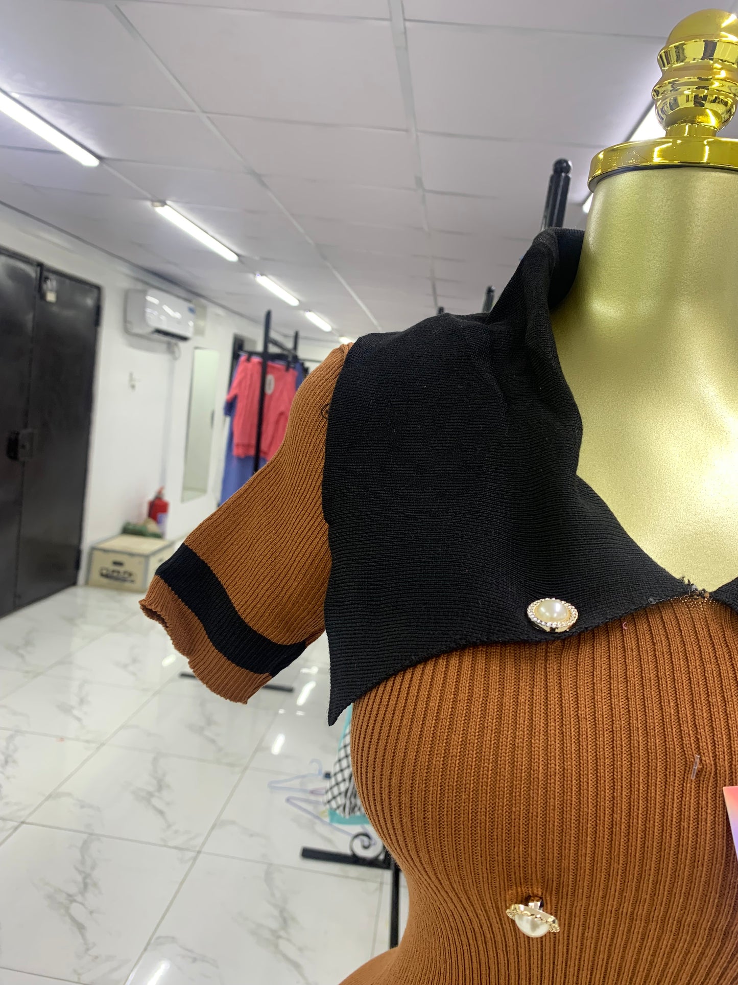 Double breasted brown gown
